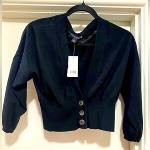 Women’s black shrug sweater